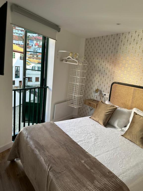 Apartamentos Urbanin II Plaza De San Pedro Cudillero Eksteriør billede